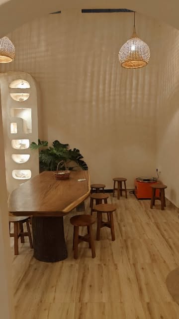 Casa do Azul interior with warm lighting and display shelves