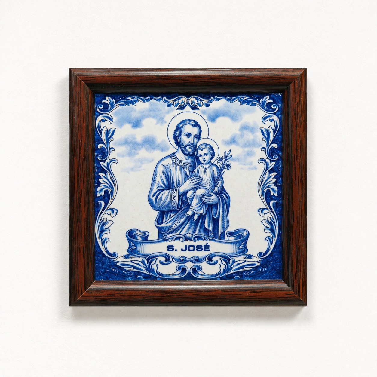 Blue and white framed tile artwork