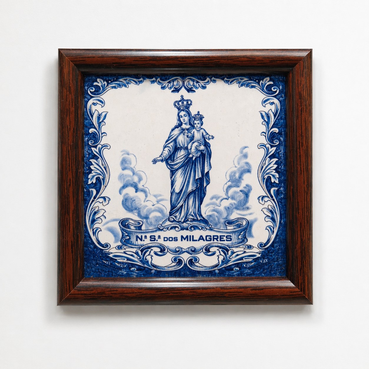 Blue and white framed tile artwork
