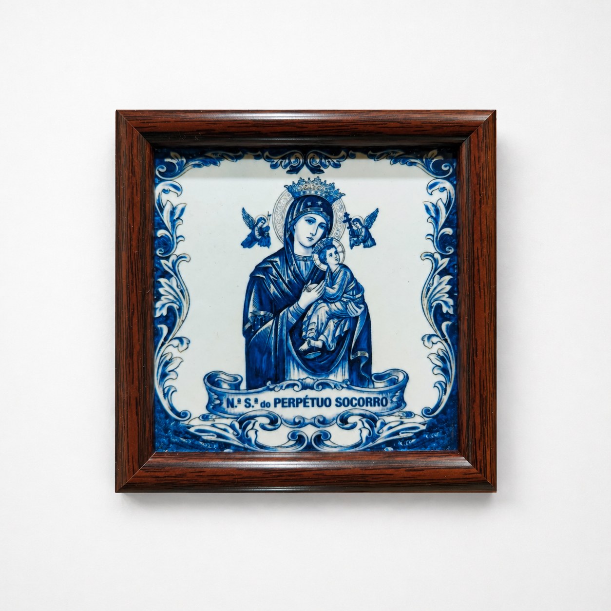 Blue and white framed tile artwork
